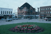 1514-1524 11TH ST, a English Revival Styles large retail building, built in Monroe, Wisconsin in 1900.