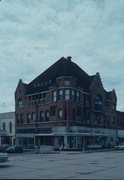 1514-1524 11TH ST, a English Revival Styles large retail building, built in Monroe, Wisconsin in 1900.