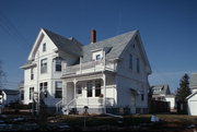 330 S MONROE ST, a Queen Anne house, built in Monticello, Wisconsin in 1904.