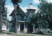 818 1ST ST, a Queen Anne house, built in New Glarus, Wisconsin in 1909.