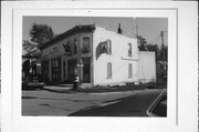 102-104 HOTEL ST, a Commercial Vernacular retail building, built in Brooklyn, Wisconsin in 1909.