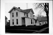 1402 9TH ST, a Gabled Ell house, built in Monroe, Wisconsin in 1873.