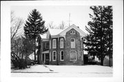 701 17TH AVE, a Queen Anne house, built in Monroe, Wisconsin in 1850.