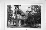 818 1ST ST, a Queen Anne house, built in New Glarus, Wisconsin in 1909.