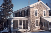 147 E 2ND ST, a Greek Revival house, built in Marquette, Wisconsin in 1852.