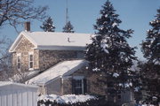 147 E 2ND ST, a Greek Revival house, built in Marquette, Wisconsin in 1852.