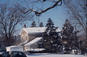 147 E 2ND ST, a Greek Revival house, built in Marquette, Wisconsin in 1852.