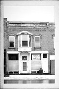 110-112-112A E HURON ST, a Italianate small retail building, built in Berlin, Wisconsin in 1893.