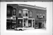 110-112-112A E HURON ST, a Italianate small retail building, built in Berlin, Wisconsin in 1893.