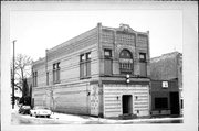 124 E HURON ST, a Romanesque Revival meeting hall, built in Berlin, Wisconsin in 1889.