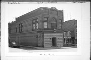 124 E HURON ST, a Romanesque Revival social recreational/fraternal hall, built in Berlin, Wisconsin in 1889.