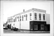 102-102A W HURON/107-109 S WIS, a Commercial Vernacular small retail building, built in Berlin, Wisconsin in 1865.
