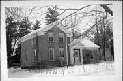 156 N STATE ST, a Greek Revival house, built in Berlin, Wisconsin in 1871.