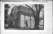 170 N WISCONSIN ST, a Second Empire house, built in Berlin, Wisconsin in 1881.