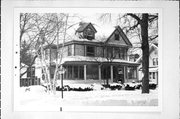 215 N BRIDGE ST, a Queen Anne house, built in Markesan, Wisconsin in 1910.