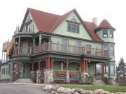 8323 W BURNHAM ST, a Queen Anne house, built in West Allis, Wisconsin in 1886.