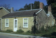 28 SHAKE RAG ST, a Federal house, built in Mineral Point, Wisconsin in 1844.