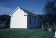 COUNTY HIGHWAY T, a Greek Revival church, built in Ridgeway, Wisconsin in 1862.