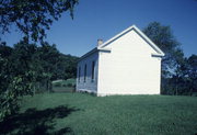 COUNTY HIGHWAY T, a Greek Revival church, built in Ridgeway, Wisconsin in 1862.