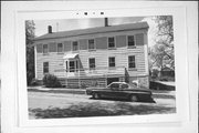 310 N MAIN ST, a Greek Revival lodging-hotel, built in Dodgeville, Wisconsin in 1849.
