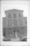 221 COMMERCE ST, a Italianate small retail building, built in Mineral Point, Wisconsin in 1857.