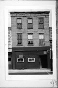 221 COMMERCE ST, a Italianate small retail building, built in Mineral Point, Wisconsin in 1857.