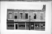 223 COMMERCE ST, a Commercial Vernacular small retail building, built in Mineral Point, Wisconsin in 1877.
