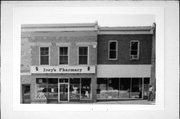 128 HIGH ST, a Italianate small retail building, built in Mineral Point, Wisconsin in 1842.