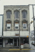 131 N MAIN ST, a Italianate retail building, built in Fort Atkinson, Wisconsin in 1857.