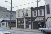 101 S MAIN ST, a Commercial Vernacular small retail building, built in Fort Atkinson, Wisconsin in 1871.
