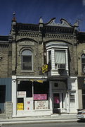 107-109 N MAIN ST, a Queen Anne small retail building, built in Jefferson, Wisconsin in 1892.
