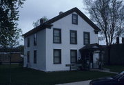 226 MAIN ST, a Greek Revival house, built in Palmyra, Wisconsin in 1845.