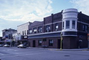 312/320 E MAIN ST, a Commercial Vernacular retail building, built in Watertown, Wisconsin in 1910.