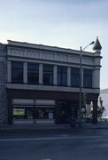 301 E MAIN ST, a Romanesque Revival large retail building, built in Watertown, Wisconsin in 1876.