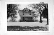 N202 U.S. HIGHWAY 12, a American Foursquare house, built in Koshkonong, Wisconsin in 1900.