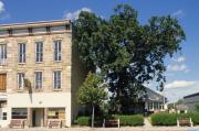 161-165 S MAIN ST, a Italianate large retail building, built in Lodi, Wisconsin in 1866.
