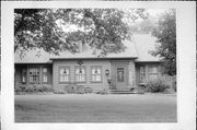 826 WHITEWATER AVE, a Colonial Revival/Georgian Revival house, built in Fort Atkinson, Wisconsin in 1941.