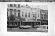 109-111 S MAIN ST, a Early Gothic Revival retail building, built in Jefferson, Wisconsin in 1877.