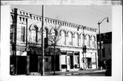 129-133 E RACINE ST, a Italianate large retail building, built in Jefferson, Wisconsin in 1884.