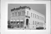 203 W LAKE ST, a Italianate retail building, built in Lake Mills, Wisconsin in 1892.