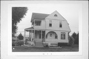 335 N MONROE ST, a Shingle Style house, built in Waterloo, Wisconsin in 1894.