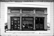 218 S 1ST ST, a Neoclassical/Beaux Arts small retail building, built in Watertown, Wisconsin in 1920.