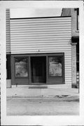 111 S 3RD ST, a Commercial Vernacular small retail building, built in Watertown, Wisconsin in 1865.