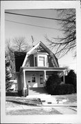 905 S. Fifth St., a Dutch Colonial Revival house, built in Watertown, Wisconsin in 1924.