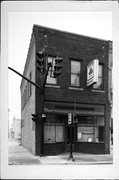 13 E MAIN ST, a Commercial Vernacular small retail building, built in Watertown, Wisconsin in 1867.