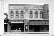 208-210 E MAIN ST, a Romanesque Revival large retail building, built in Watertown, Wisconsin in 1864.