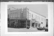 301 E MAIN ST, a Romanesque Revival large retail building, built in Watertown, Wisconsin in 1876.
