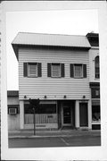 415 E MAIN ST, a Commercial Vernacular small retail building, built in Watertown, Wisconsin in 1880.