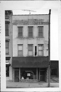 114 W MAIN ST, a Commercial Vernacular small retail building, built in Watertown, Wisconsin in 1852.