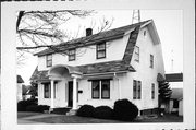 223 N WASHINGTON ST, a Dutch Colonial Revival house, built in Watertown, Wisconsin in 1929.